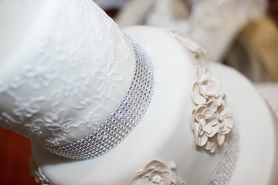 White wedding roses and adorned with precious stones