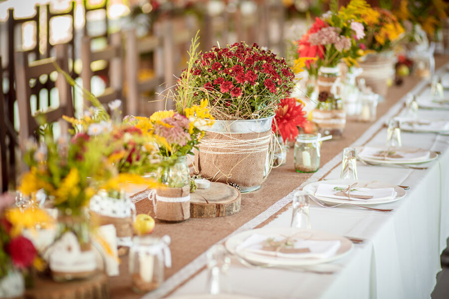 decorations made of wood and wildflowers served on the festive table