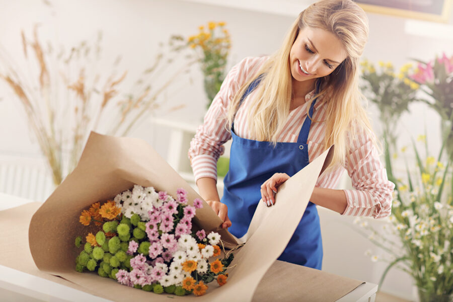 Picture of female florist working in flower shop